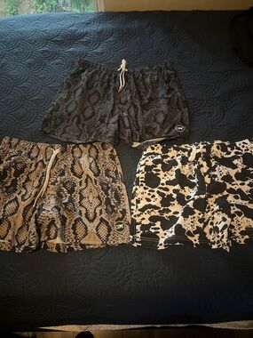Cove Men's Animal Print Shorts (3) - Snake Skin Sand, Snake Skin Black, and Cow